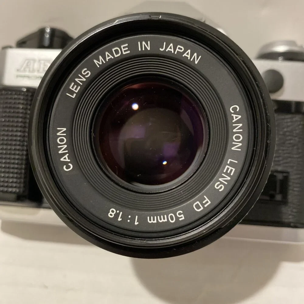 Canon Silver and Black Film Camera Kit with Lenses and Flash